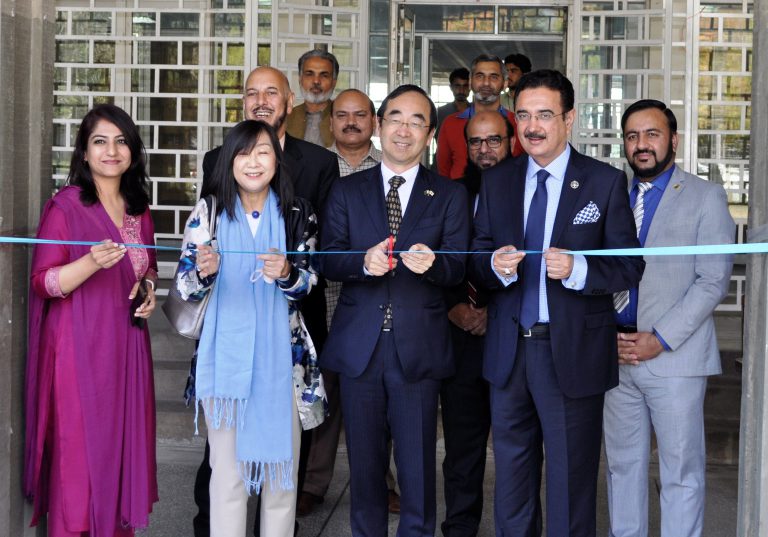 Ambassador of Japan in Pakistan cutting the Inaugural Tap of Japanese Calendars Exhibition at Quid-i-Azam University, Islamabad