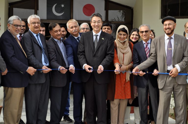 Mr. Ryuji Iwasaki, Head of Public Affairs Section, Embassy of Japan cutting the Inaugural Tap of Japanese Calendars Exhibition at Quid-i-Azam University, Islamabad